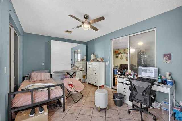 a bathroom with a double vanity sink toilet and shower