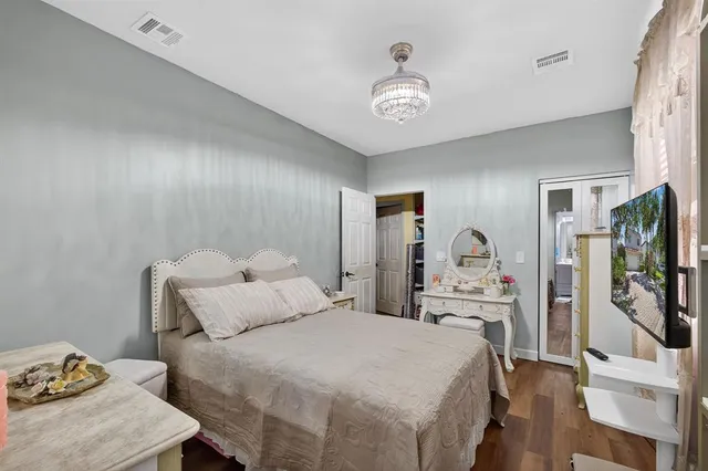 a view of an entryway with wooden floor