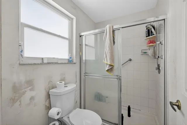 a view of a backyard with sitting area and furniture