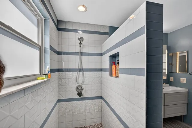 a view of swimming pool with seating area