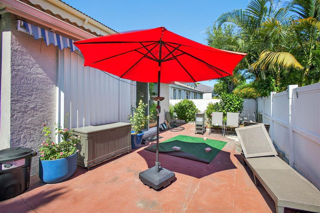 2119 Chagall Circle West Palm Beach, FL 33409 - Photo 59 of 63 a view of yard with patio