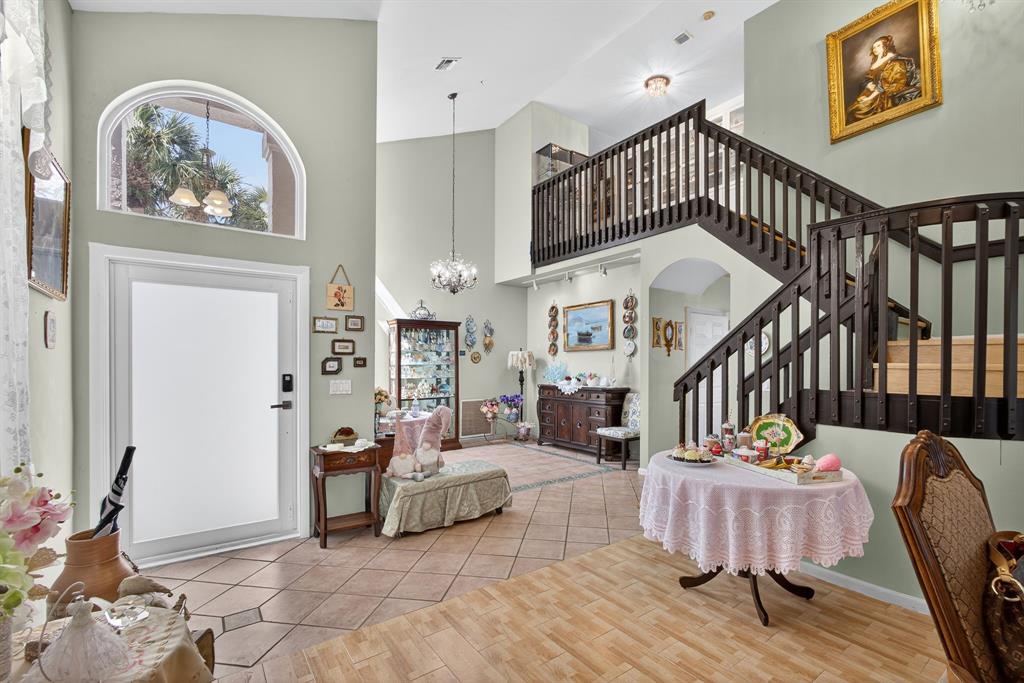 2119 Chagall Circle West Palm Beach, FL 33409 - Photo 6 of 63 a living room with furniture and wooden floor