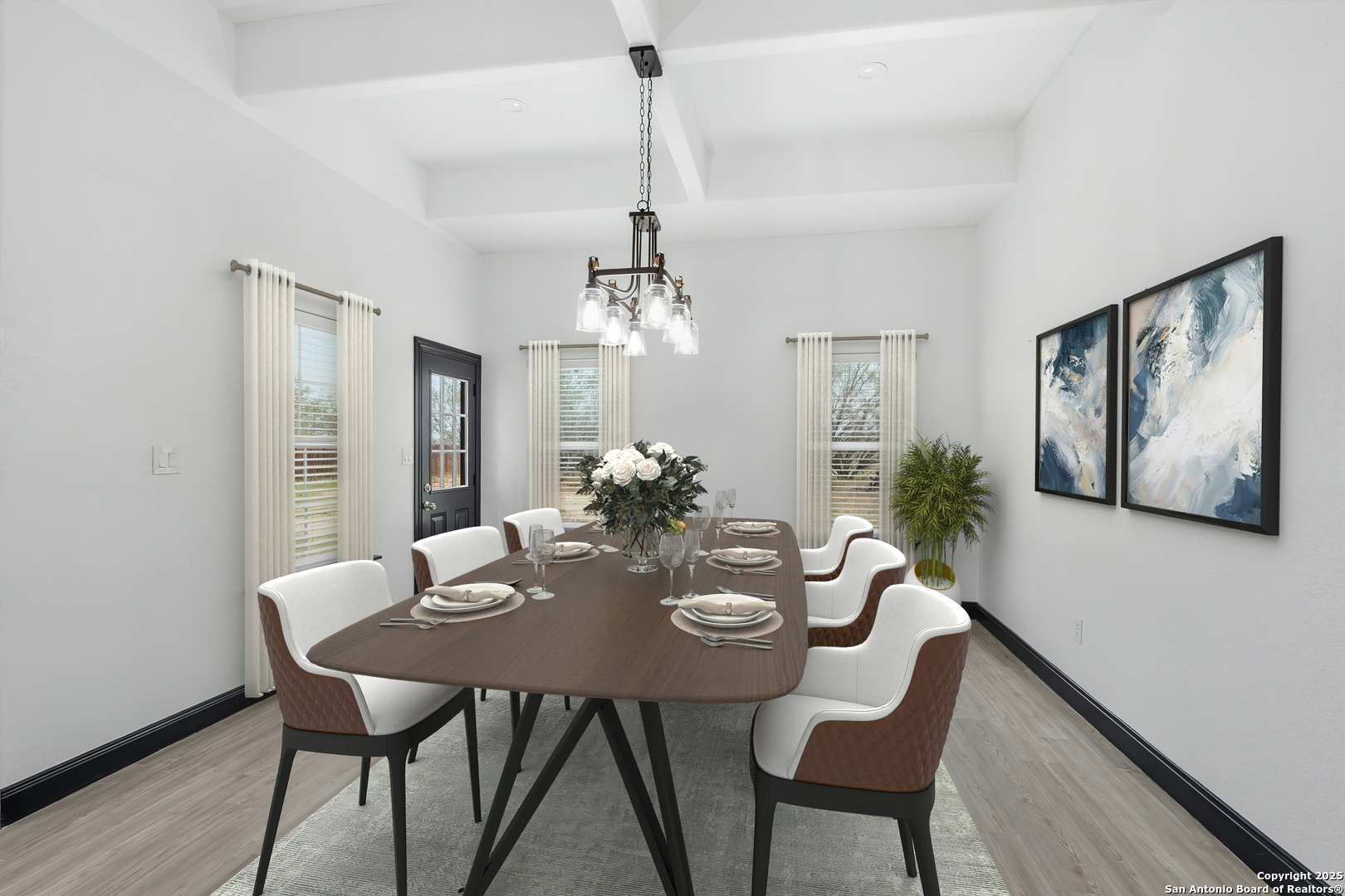 128 Hidden Ranch Court Floresville, TX 78114 - Photo 17 of 38 a view of a dining room with furniture window and wooden floor