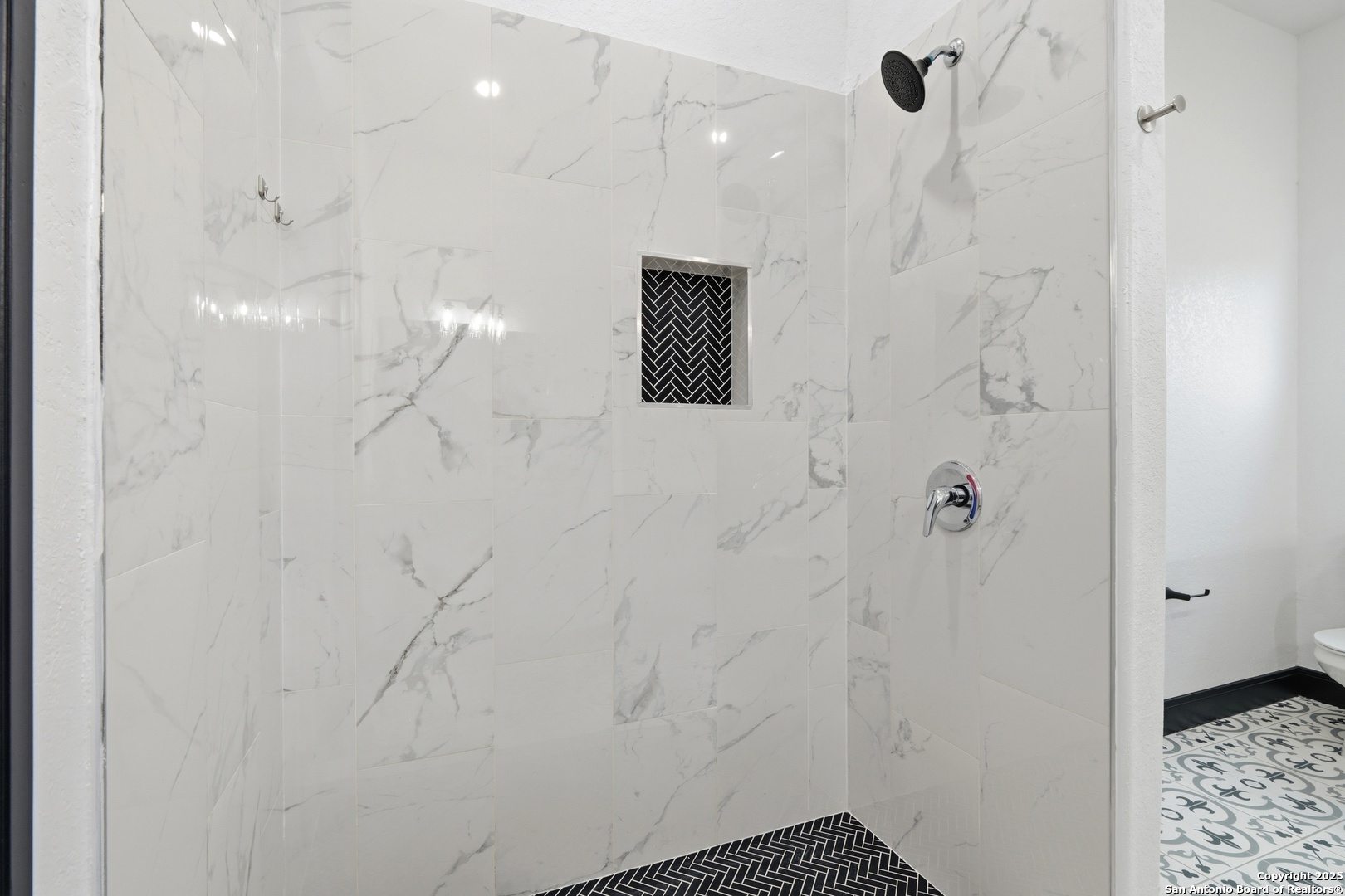 128 Hidden Ranch Court Floresville, TX 78114 - Photo 22 of 38 a bathroom with a shower and a sink