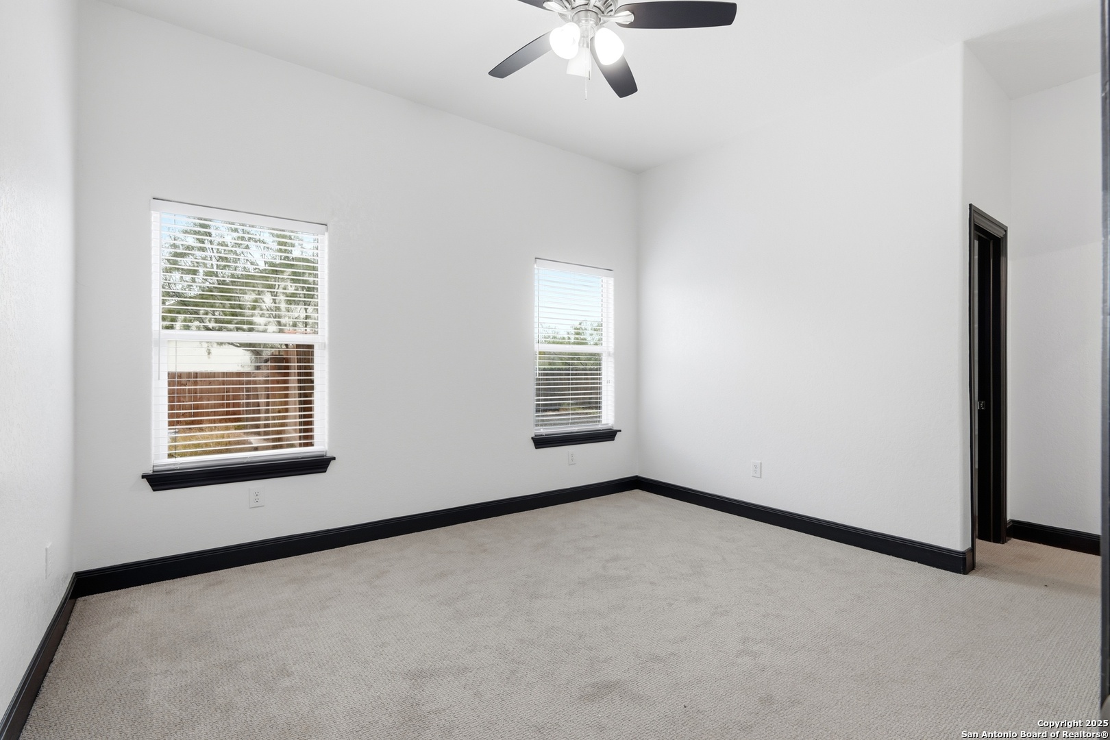 128 Hidden Ranch Court Floresville, TX 78114 - Photo 31 of 38 a view of an empty room with a window