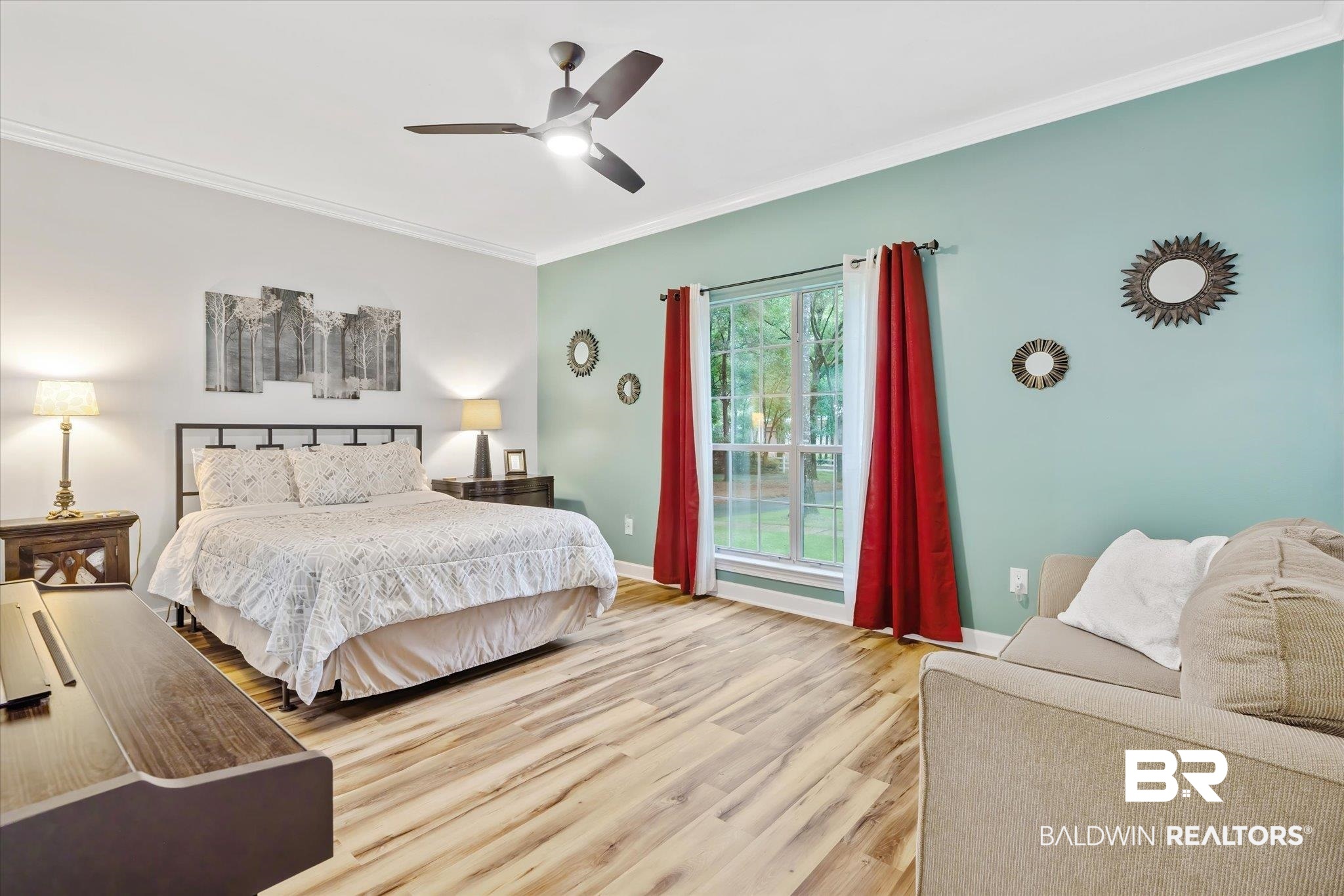 3600 Russells Lane Mobile, AL 36619 - Photo 20 of 43 Bedroom featuring ceiling fan, light hardwood / wood-style floors, and ornamental molding