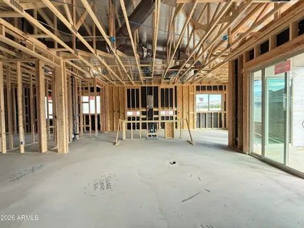 a view of a hall with wooden floor