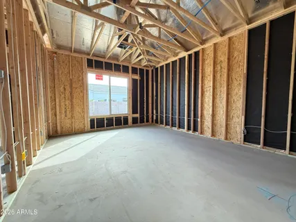 a view of a room with large windows