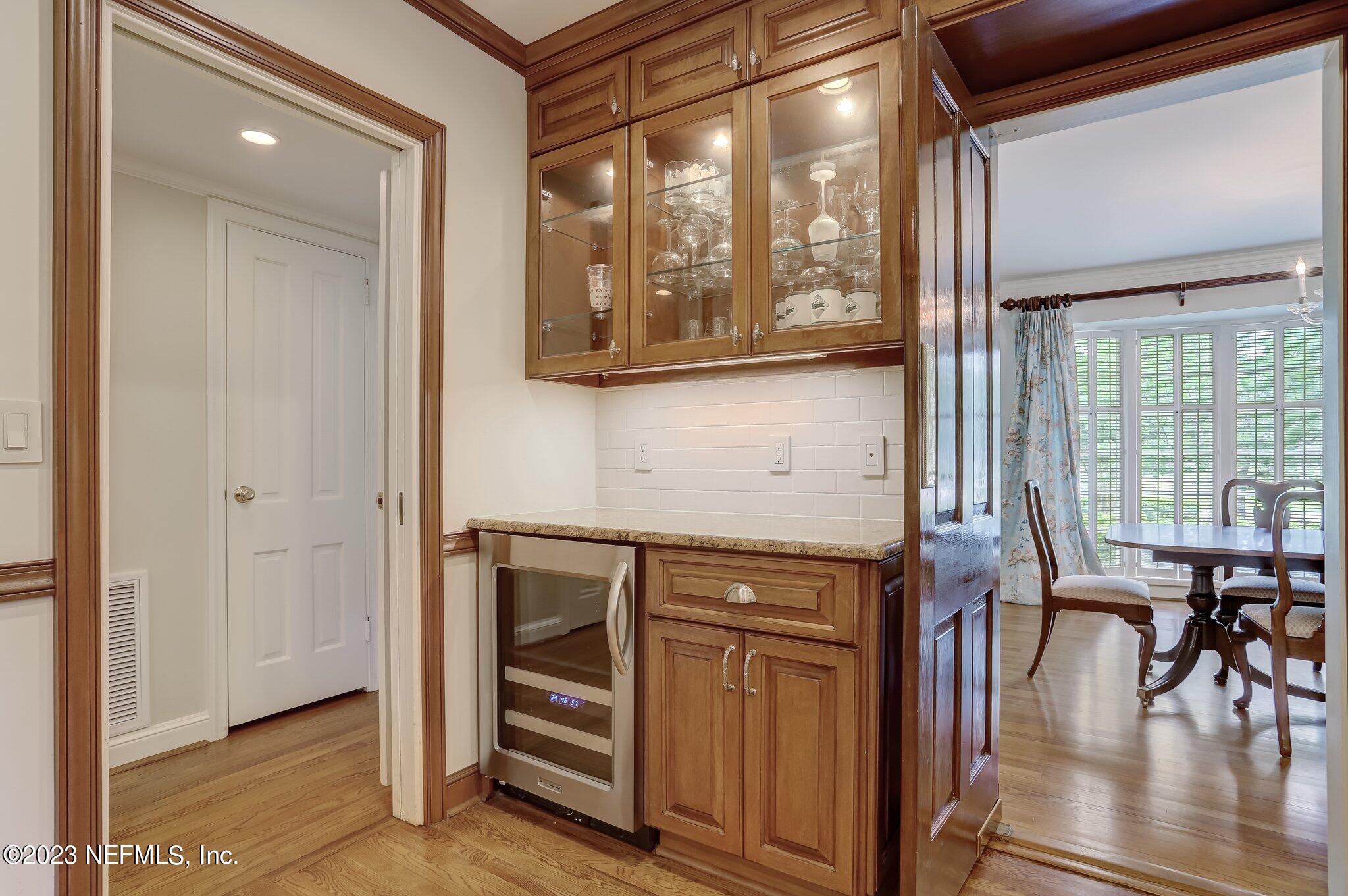 4143 Sherwood Road Jacksonville, FL 32210 - Photo 28 of 67 a view of dining room and wooden floor