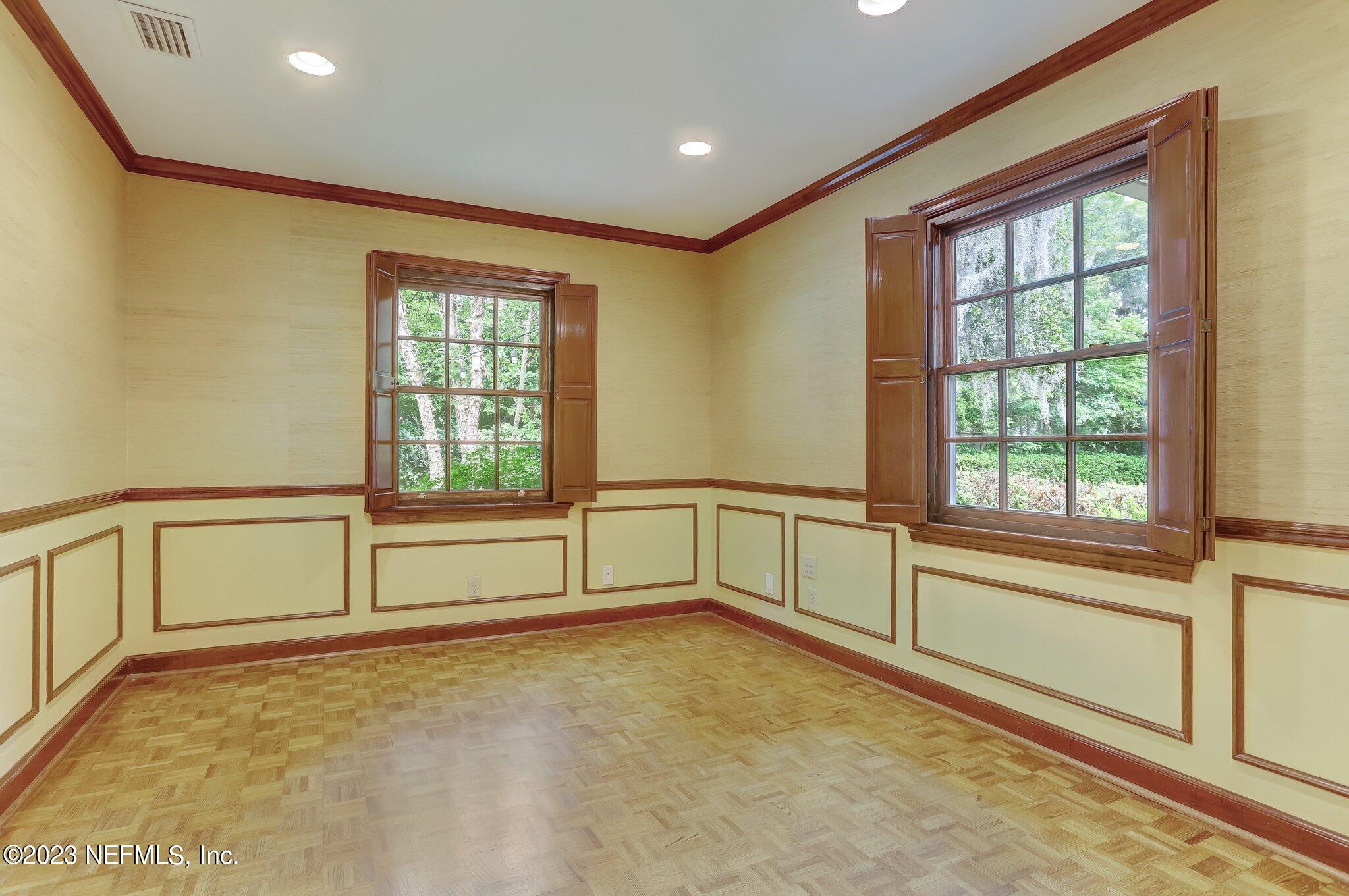 4143 Sherwood Road Jacksonville, FL 32210 - Photo 36 of 67 a view of an empty room with a window