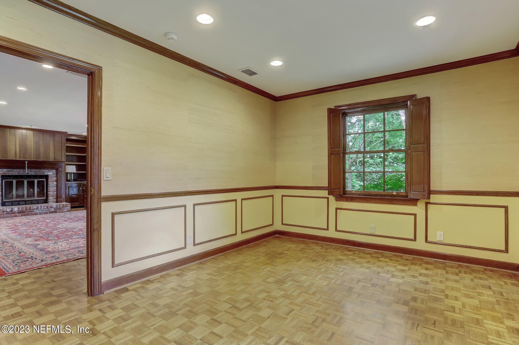 4143 Sherwood Road Jacksonville, FL 32210 - Photo 37 of 67 a view of an empty room with window
