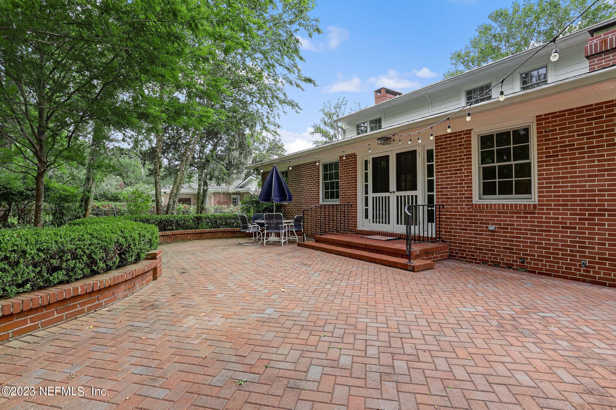 4143 Sherwood Road Jacksonville, FL 32210 - Photo 60 of 67 a view of a house with a patio