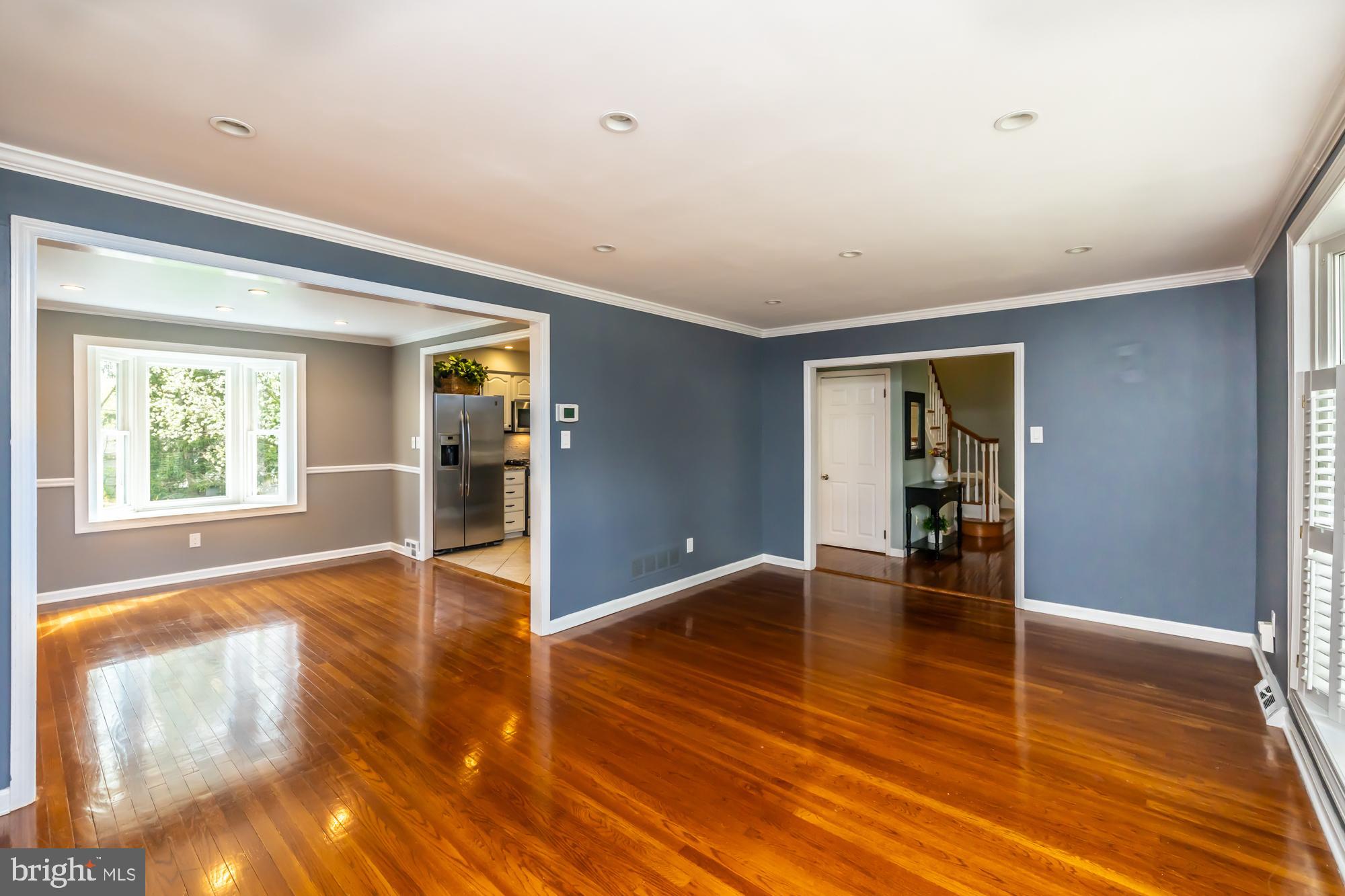 374 Devon Drive Exton, PA 19341 - Photo 19 of 50 a view of empty room with wooden floor and fan