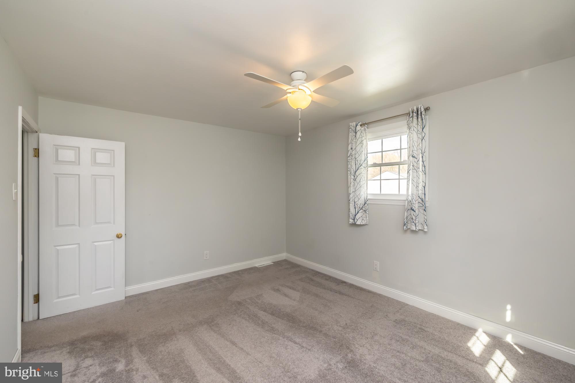 374 Devon Drive Exton, PA 19341 - Photo 39 of 50 a view of an empty room with a window