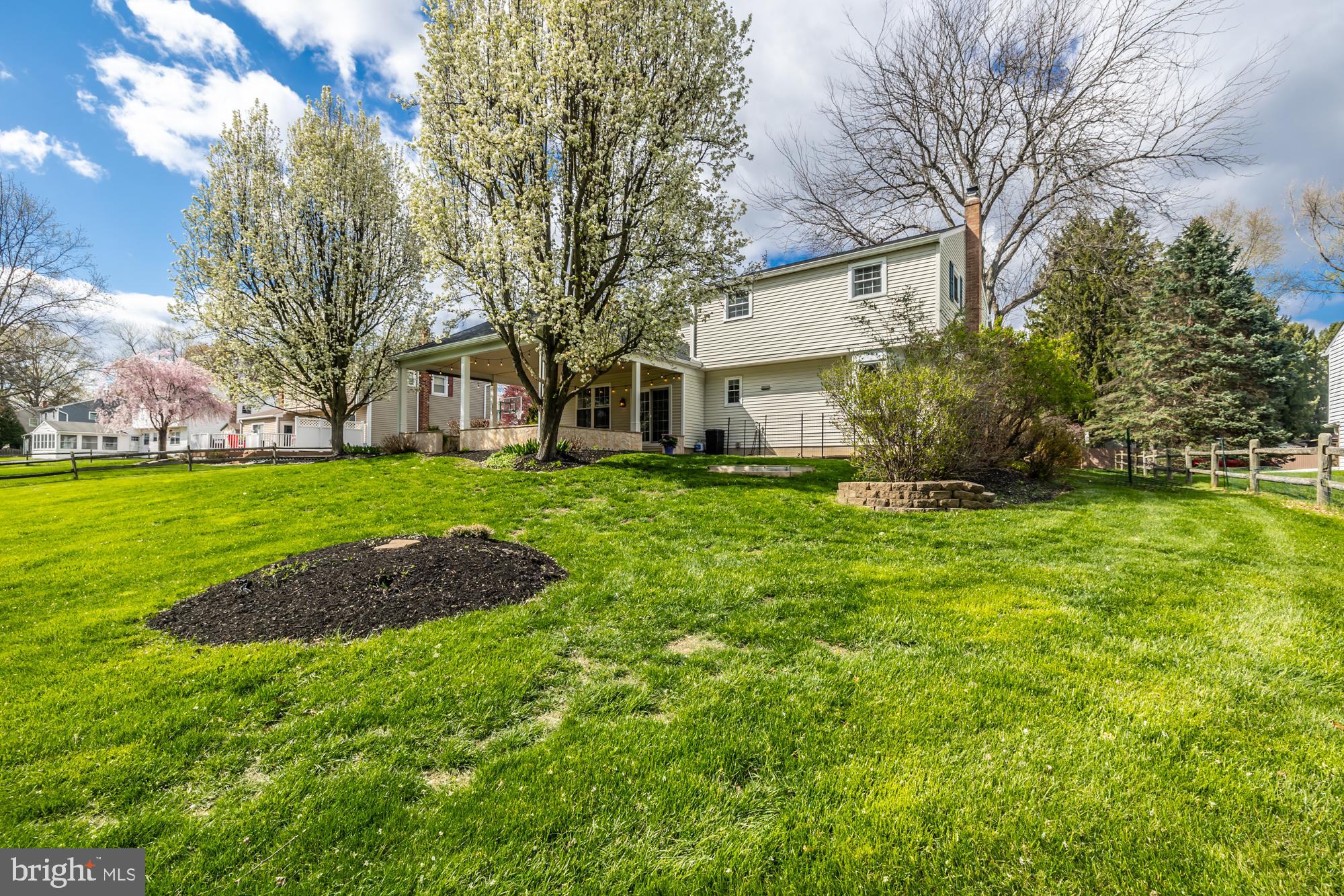 374 Devon Drive Exton, PA 19341 - Photo 10 of 50 a front view of a house with garden
