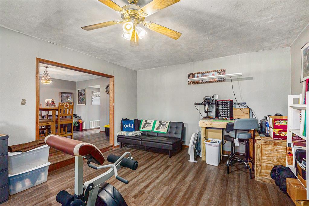 150 County 2110 Road Whitney, TX 76692 - Photo 17 of 21 a living room with furniture and a wooden floor