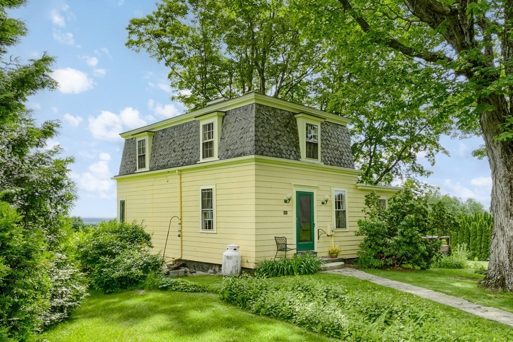 27 Worcester Road Princeton, MA 01541 - Photo 3 of 41 front view of a house with a yard