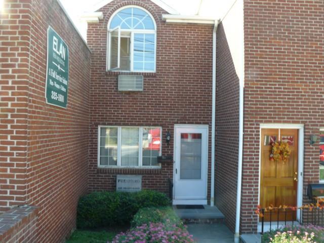 511 Elm Street Stamford, CT 06902 - Photo 1 of 1 a view of a brick house with a small entryway