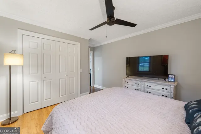 a bathroom with a sink toilet and mirror