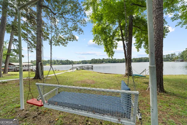 a room with furniture and a large window