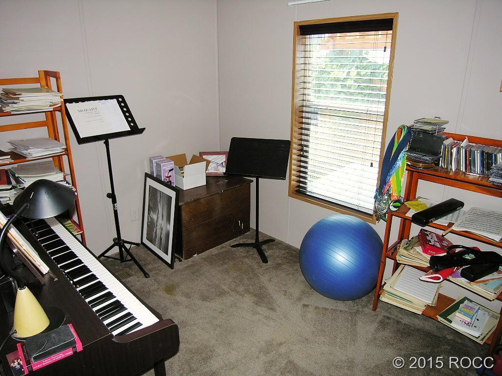 625 Walnut Street Salida, CO 81201 - Photo 11 of 15 a view of a workspace with furniture and a window