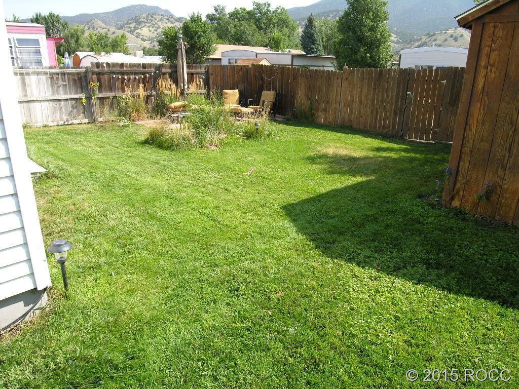 625 Walnut Street Salida, CO 81201 - Photo 15 of 15 a view of a chair and table in backyard of the house