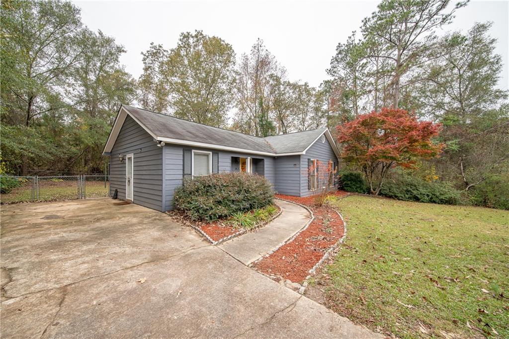 143 Lee Road 979 Phenix City, AL 36870 - Photo 4 of 37 View of front of home with a front lawn