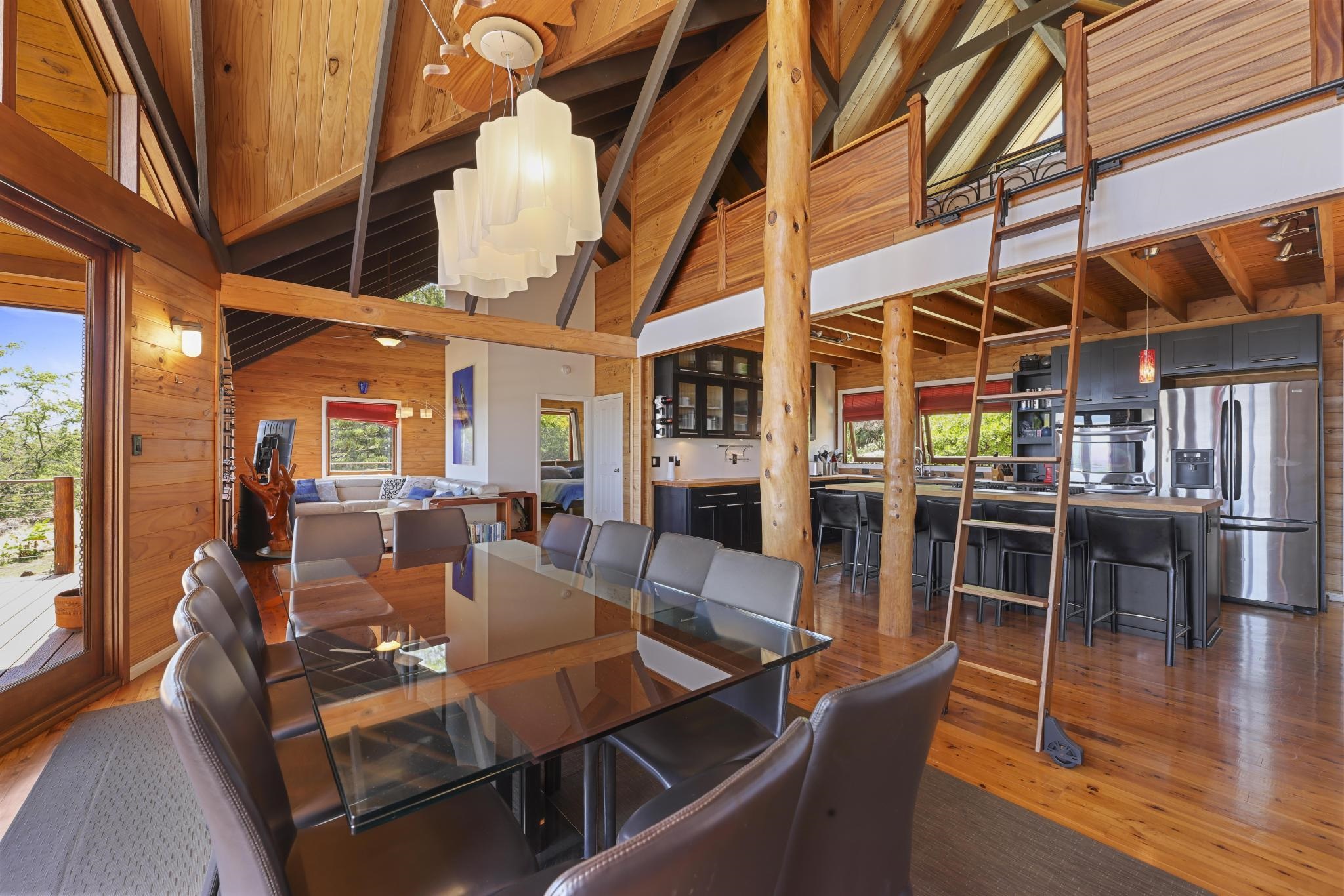 115 Ulua Road Kaunakakai, HI 96748 - Photo 12 of 49 a view of a dining room with furniture window and wooden floor