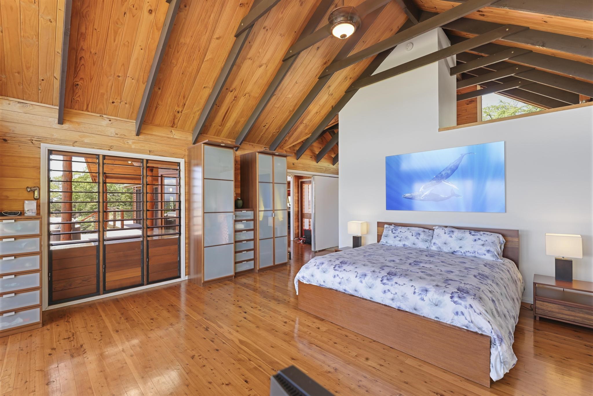 115 Ulua Road Kaunakakai, HI 96748 - Photo 20 of 49 a bedroom with a large bed and a window