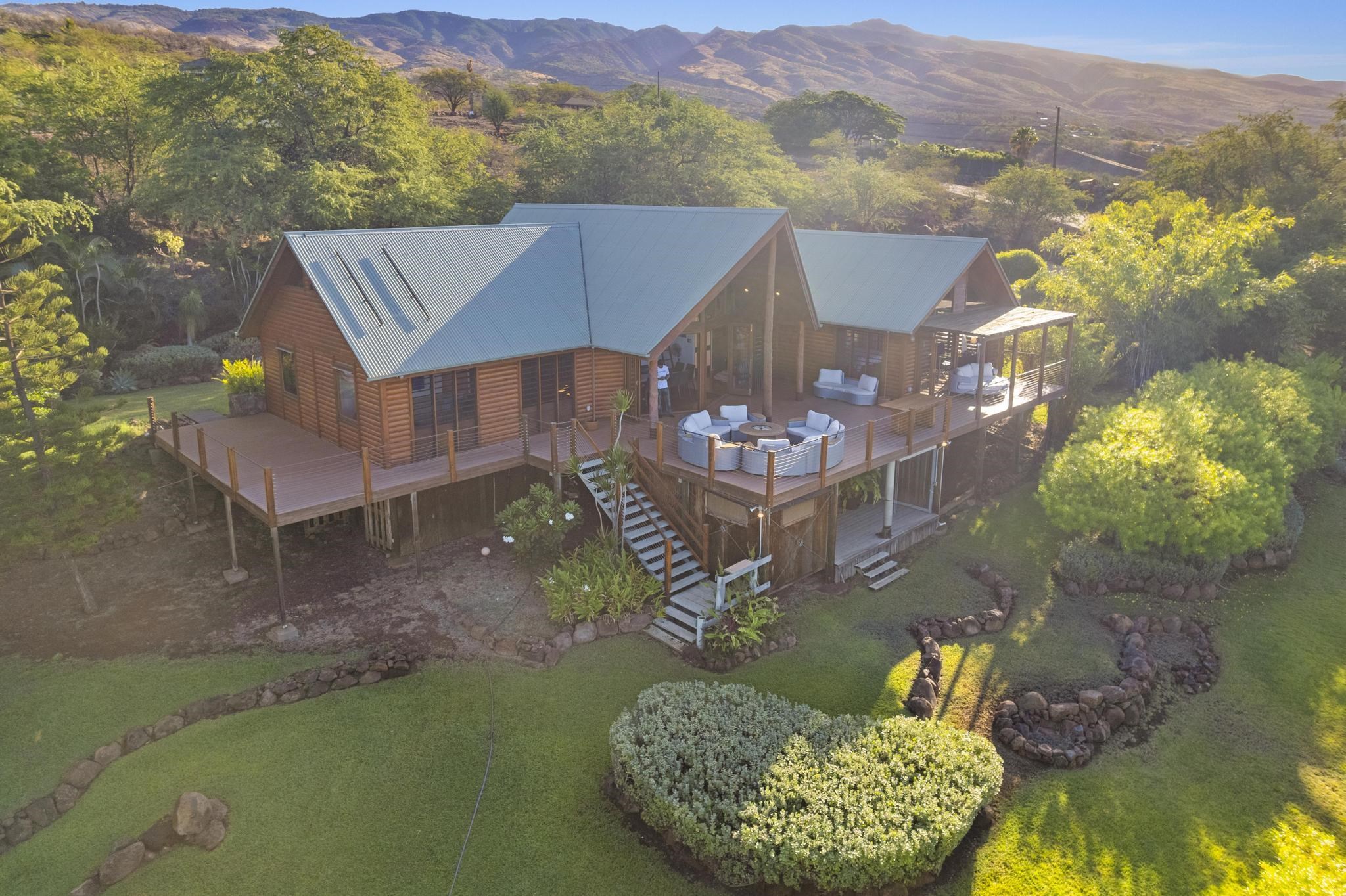 115 Ulua Road Kaunakakai, HI 96748 - Photo 23 of 49 a view of a backyard with plants and a garden