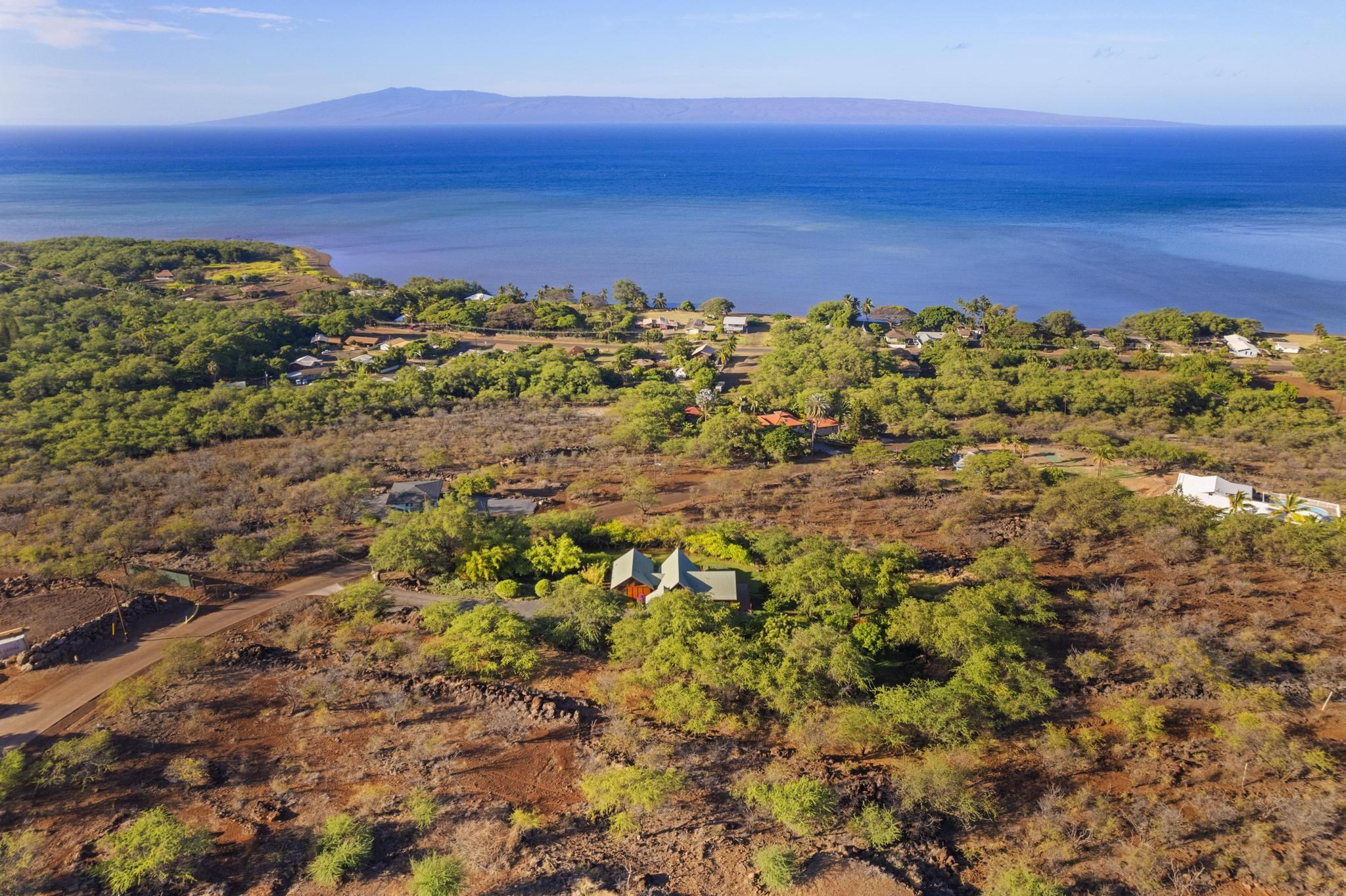 115 Ulua Road Kaunakakai, HI 96748 - Photo 28 of 49 a view of a large body of water with a building in the background