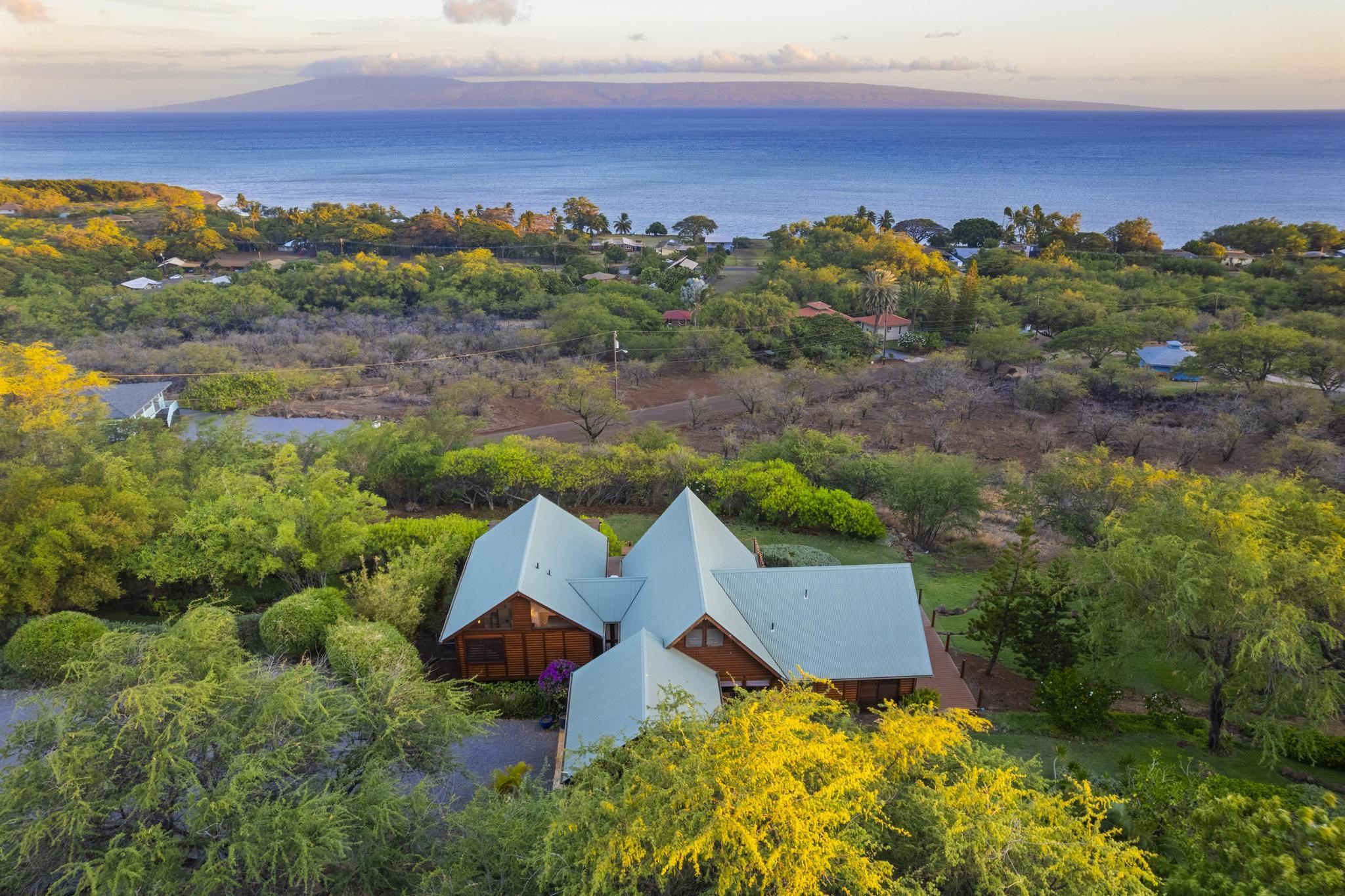 115 Ulua Road Kaunakakai, HI 96748 - Photo 32 of 49 an aerial view of a house with a yard and lake view