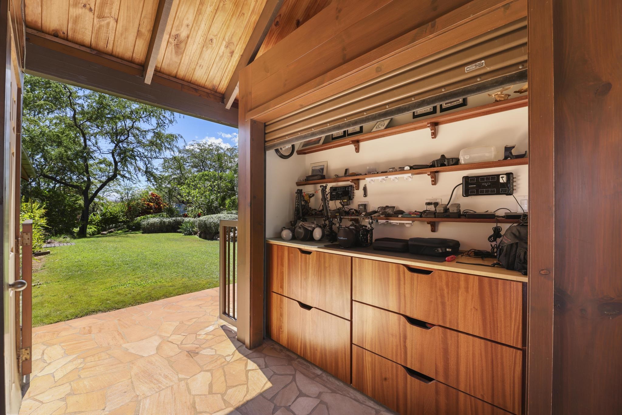 115 Ulua Road Kaunakakai, HI 96748 - Photo 37 of 49 a room with water heater and a table