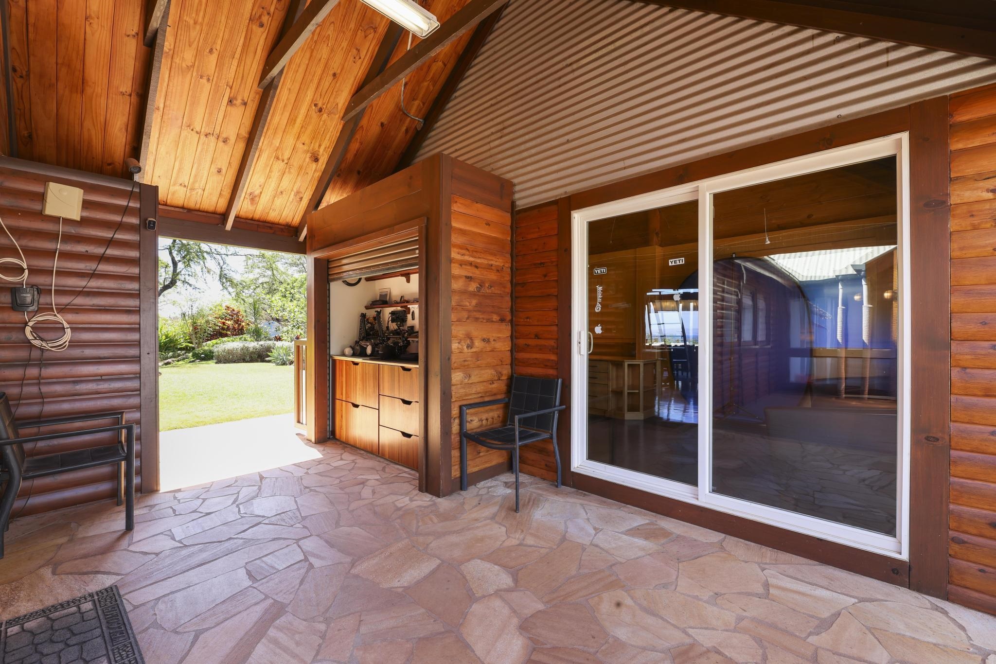 115 Ulua Road Kaunakakai, HI 96748 - Photo 38 of 49 a view of a porch with a door