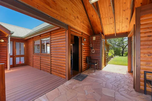 a view of a workspace with wooden floor