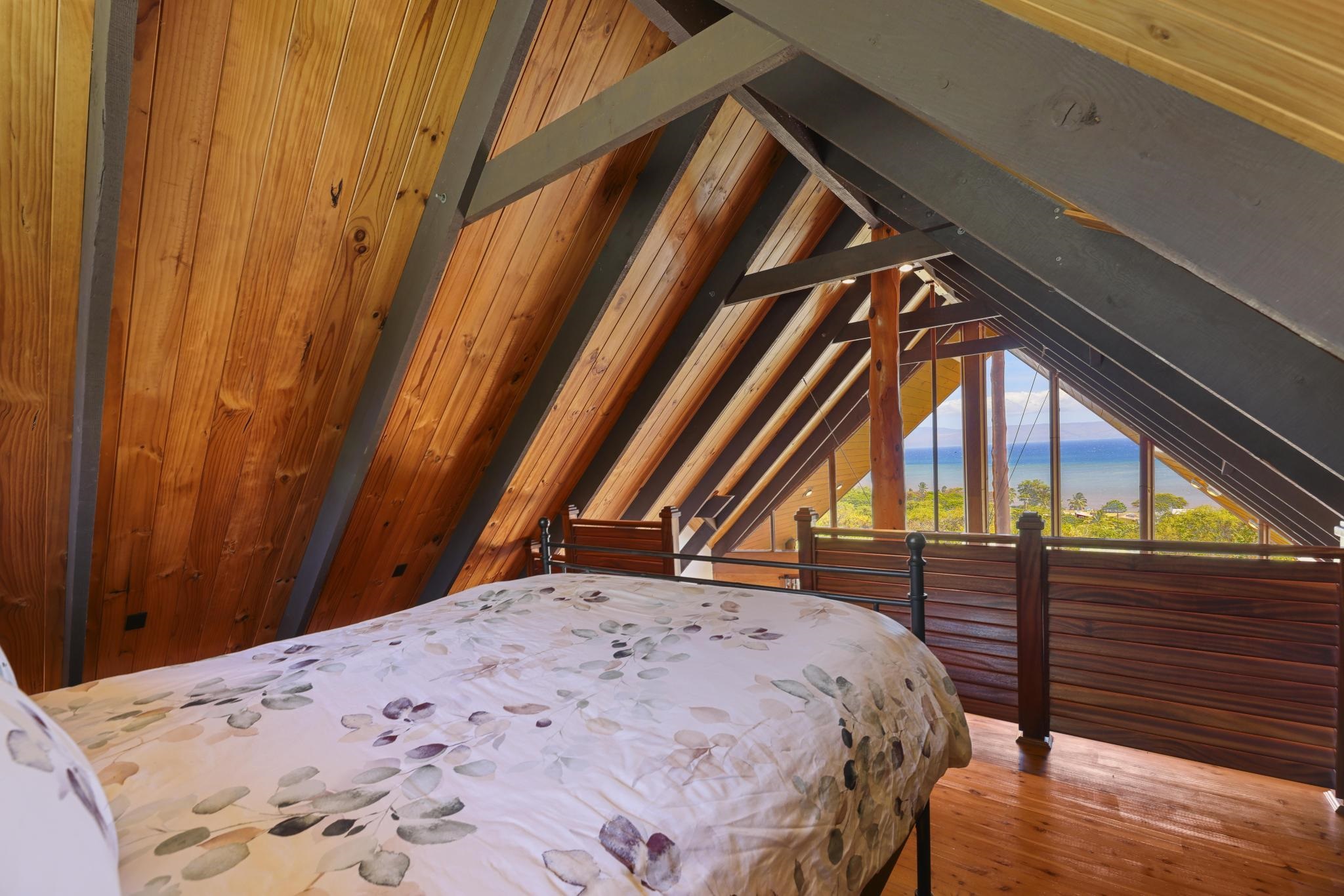 115 Ulua Road Kaunakakai, HI 96748 - Photo 49 of 49 a bedroom with a bed and wooden floor