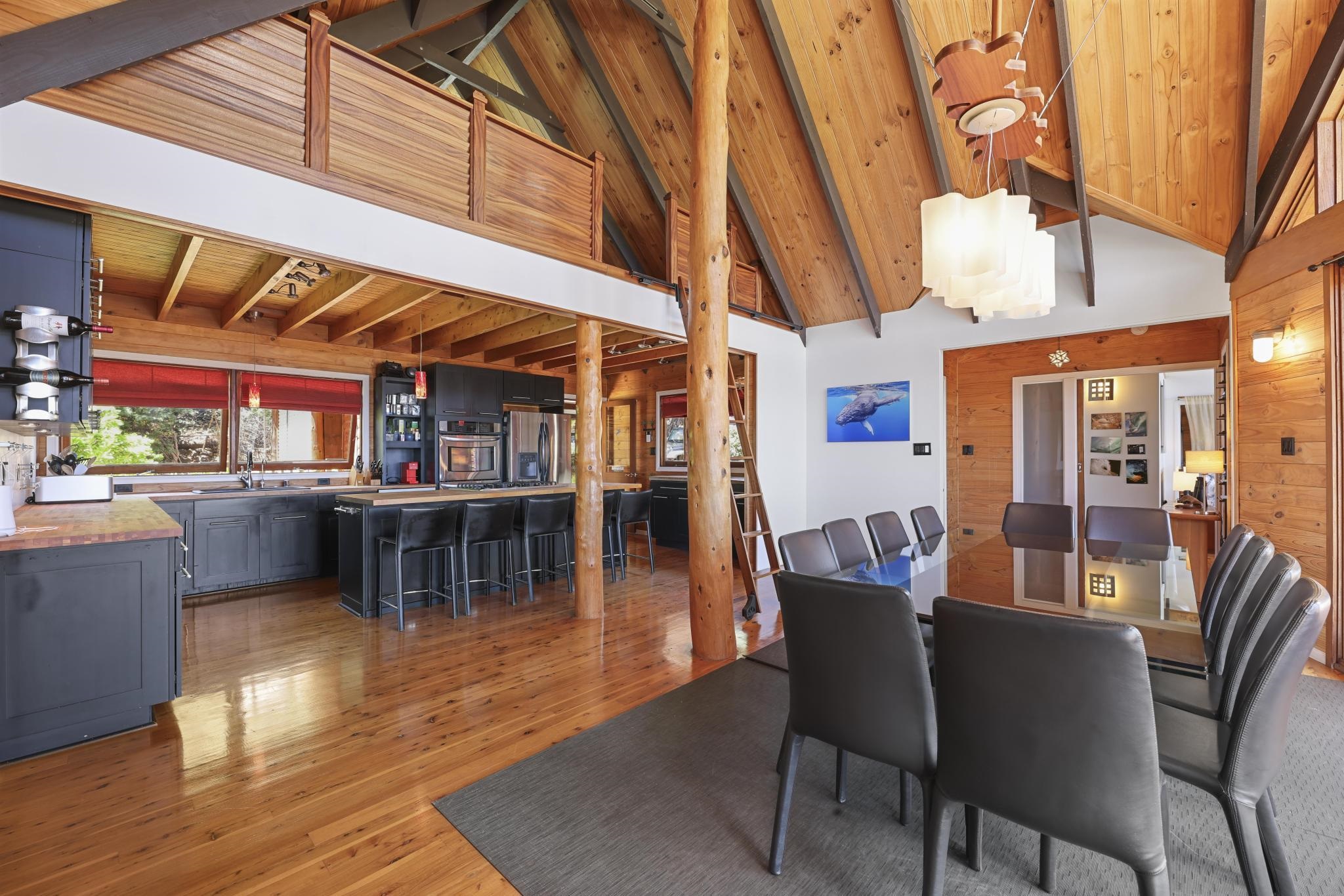115 Ulua Road Kaunakakai, HI 96748 - Photo 7 of 49 a dining room with furniture and wooden floor