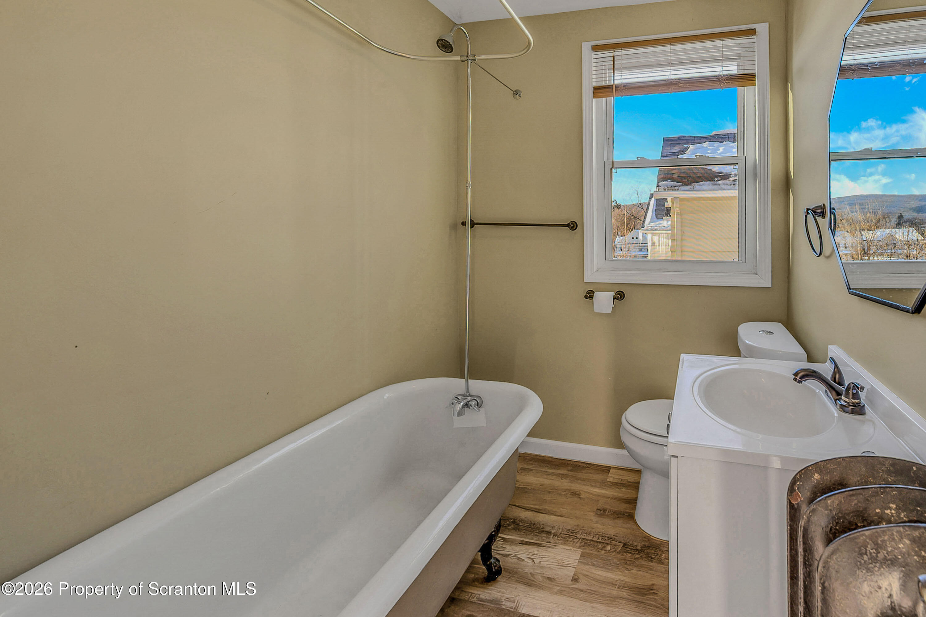227 North Rebecca Avenue, Unit 2 Scranton, PA 18504 - Photo 11 of 18 a bathroom with a tub and sink
