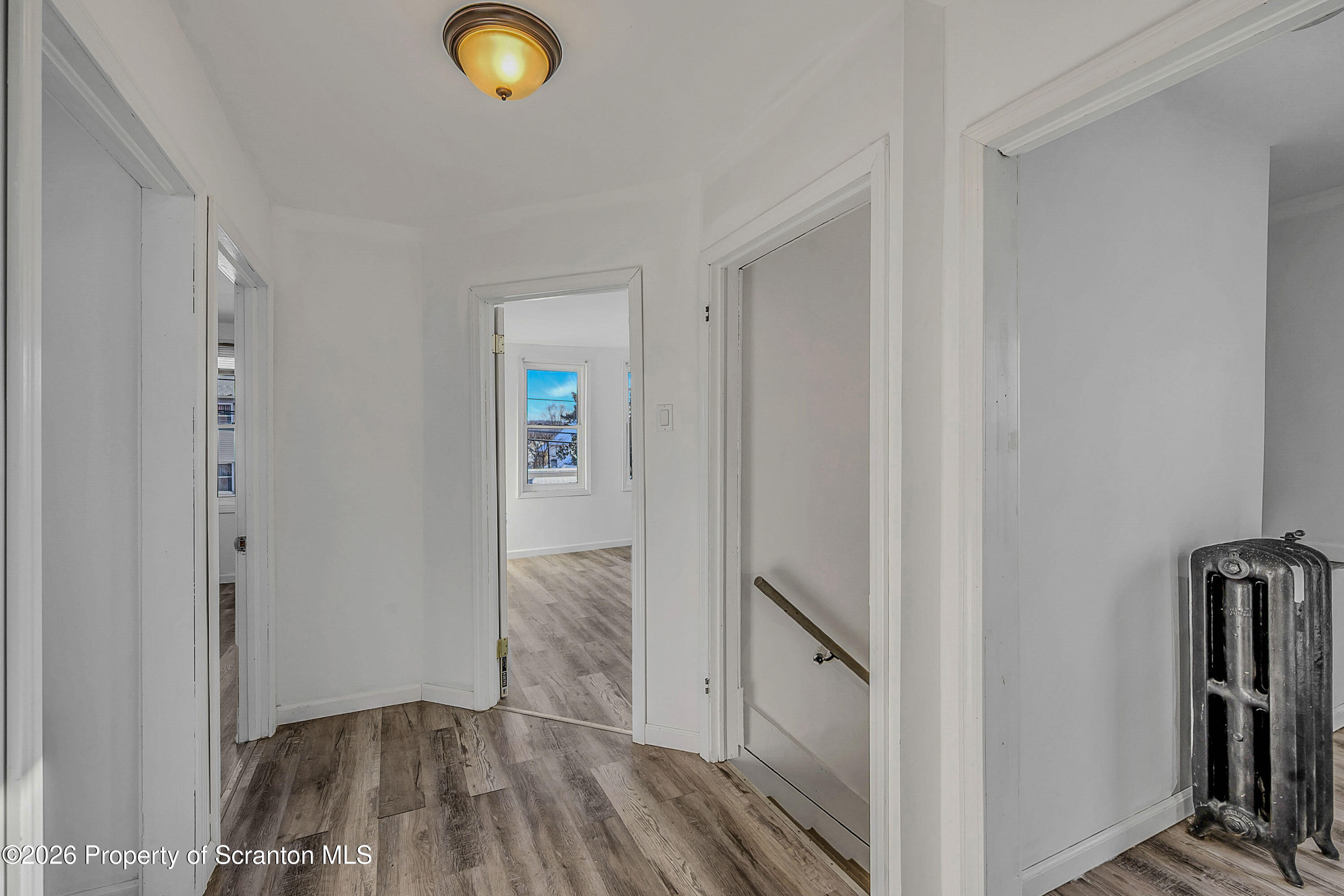227 North Rebecca Avenue, Unit 2 Scranton, PA 18504 - Photo 13 of 18 a view of livingroom with hardwood floor and window