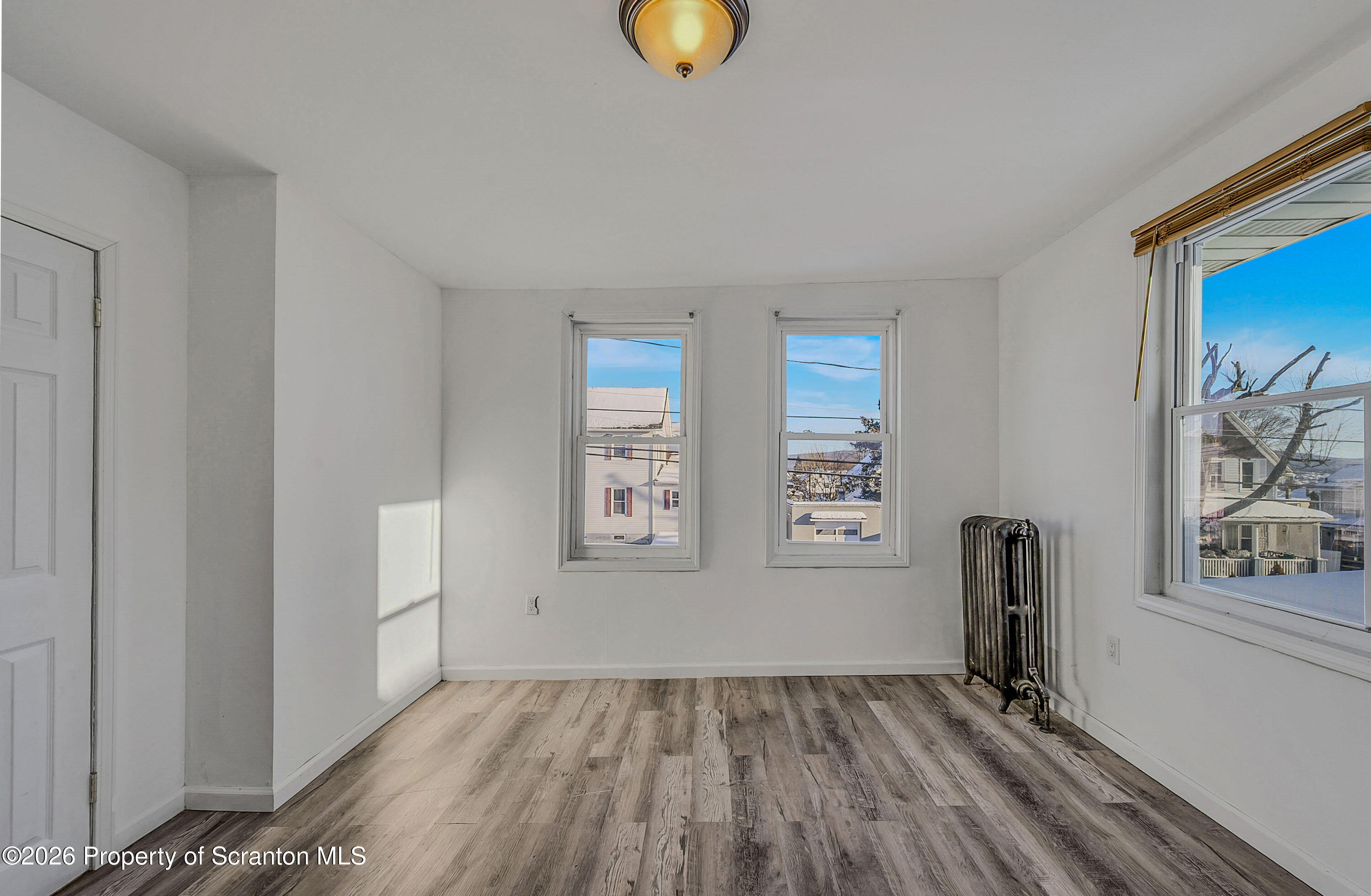 227 North Rebecca Avenue, Unit 2 Scranton, PA 18504 - Photo 5 of 18 a view of empty room with window and closet