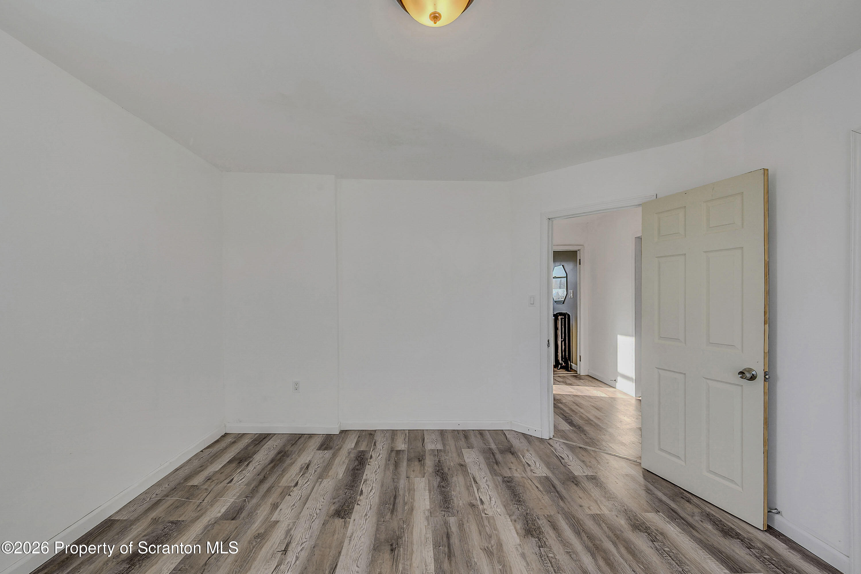 227 North Rebecca Avenue, Unit 2 Scranton, PA 18504 - Photo 6 of 18 a view of an empty room and window