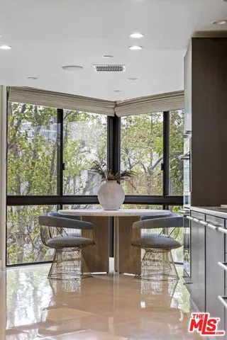 a view of a living room and window