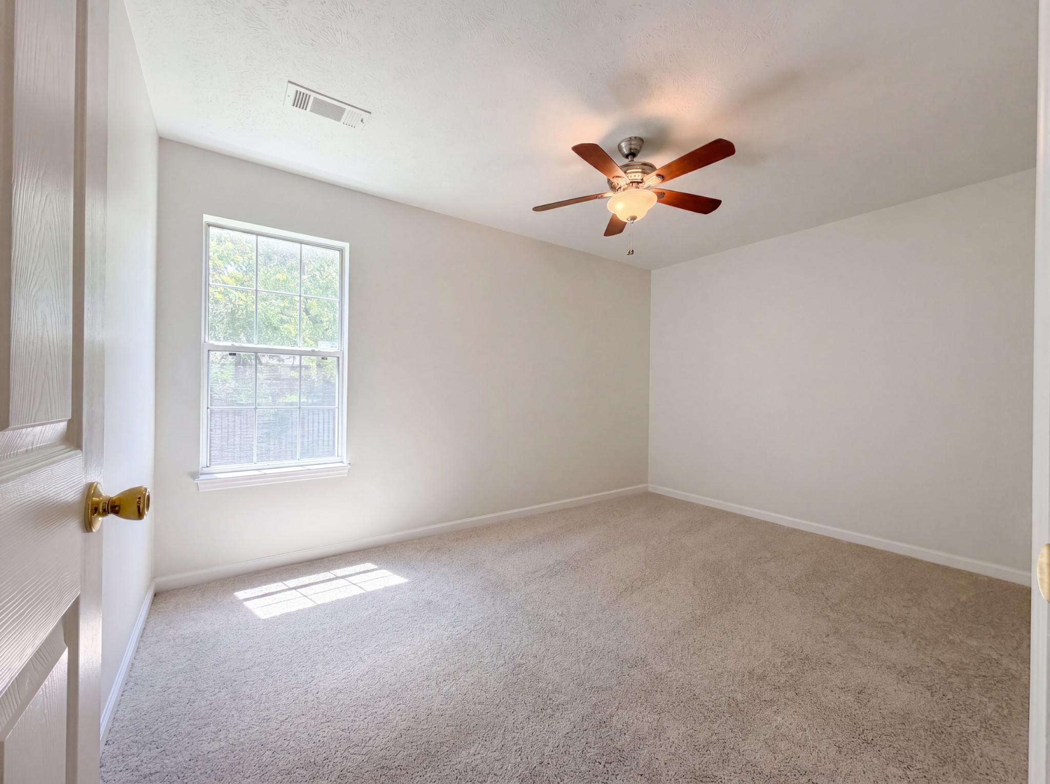 609 Sandy Spring Trail Madison, TN 37115 - Photo 11 of 16 a view of an empty room with a window