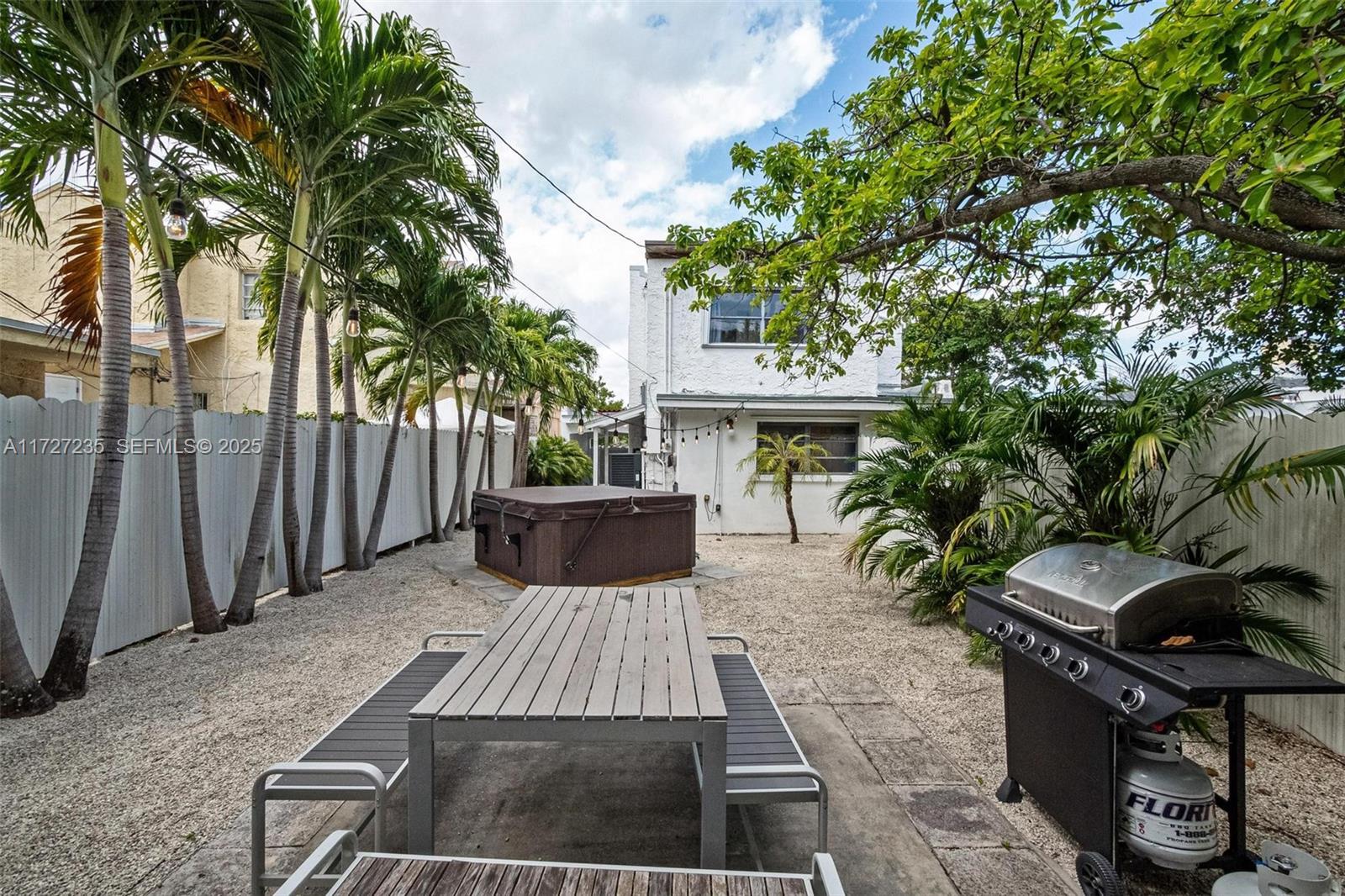 1428 Southwest 11th Terrace Miami, FL 33135 - Photo 15 of 36 a view of a backyard with sitting area