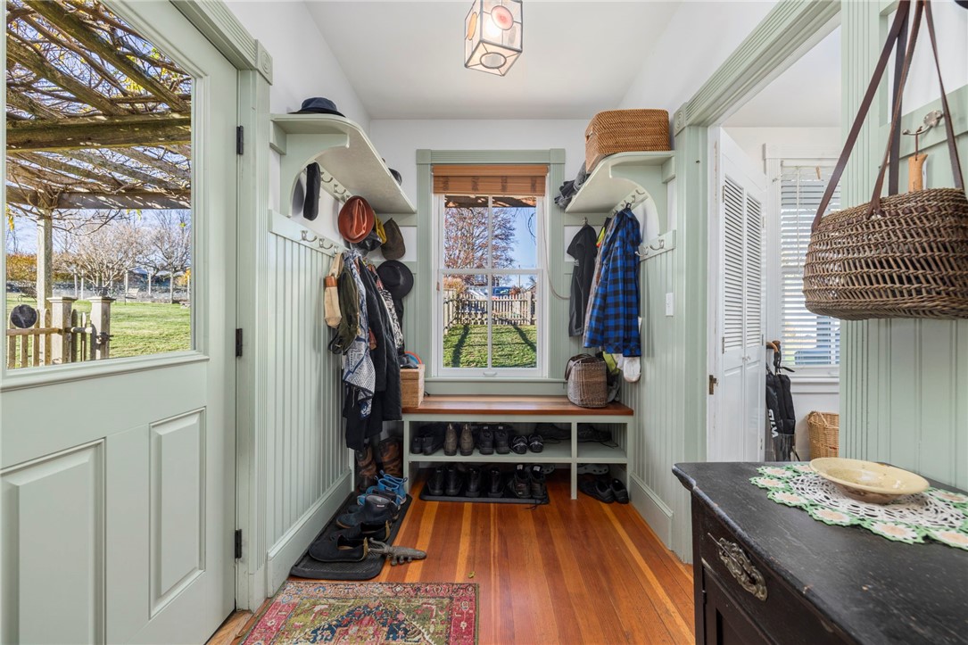 41 Walcott Avenue Jamestown, RI 02835 - Photo 11 of 50 Entry has plenty of space for dropping off your gear, it's 6'2" x 10'4". A laundry/pantry/additional storage space is through the door on right.