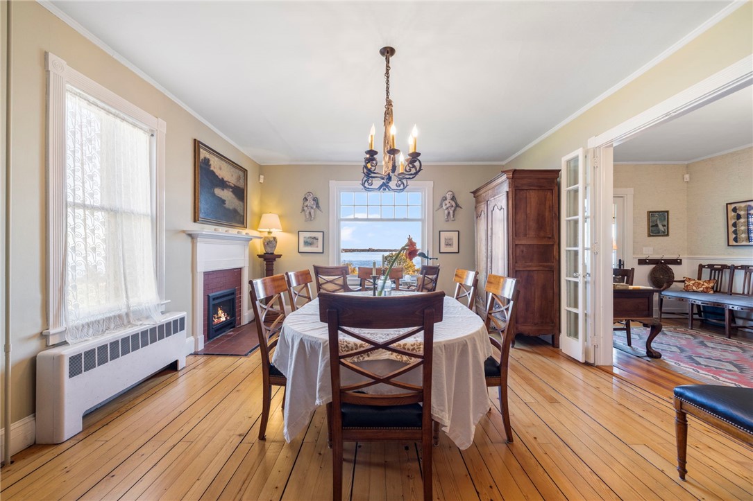 41 Walcott Avenue Jamestown, RI 02835 - Photo 15 of 50 Dining room is 14' x 21'6", and has a warm gas fireplace.