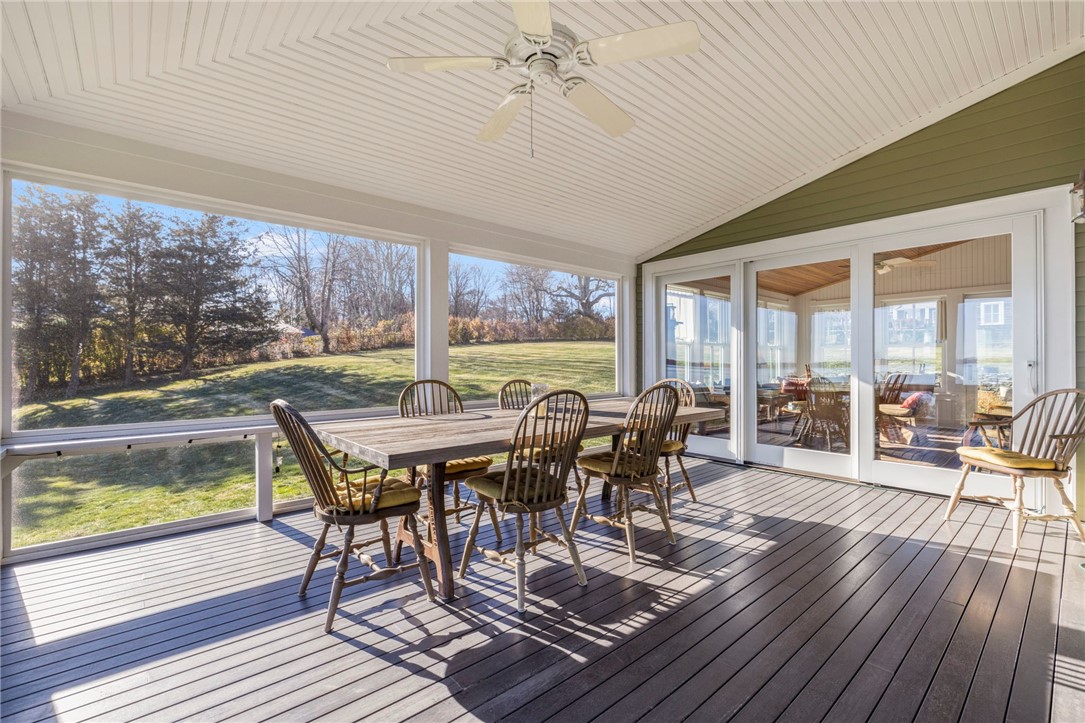 41 Walcott Avenue Jamestown, RI 02835 - Photo 20 of 50 Looking towards the year round sunroom, with an access point from the porch.