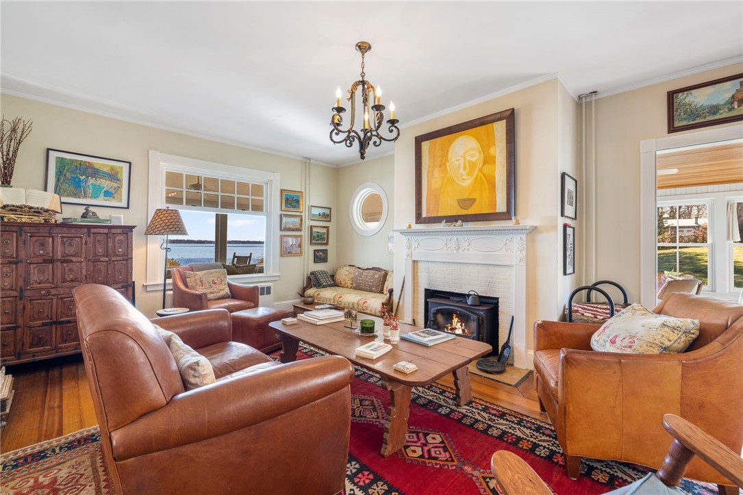 41 Walcott Avenue Jamestown, RI 02835 - Photo 24 of 50 Living room has a wood burning insert for cozy fires!