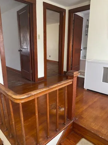 a kitchen with a refrigerator and washing machine