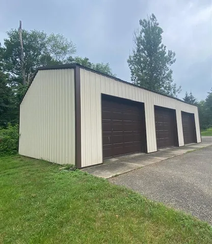 a wooden door in front of a house
